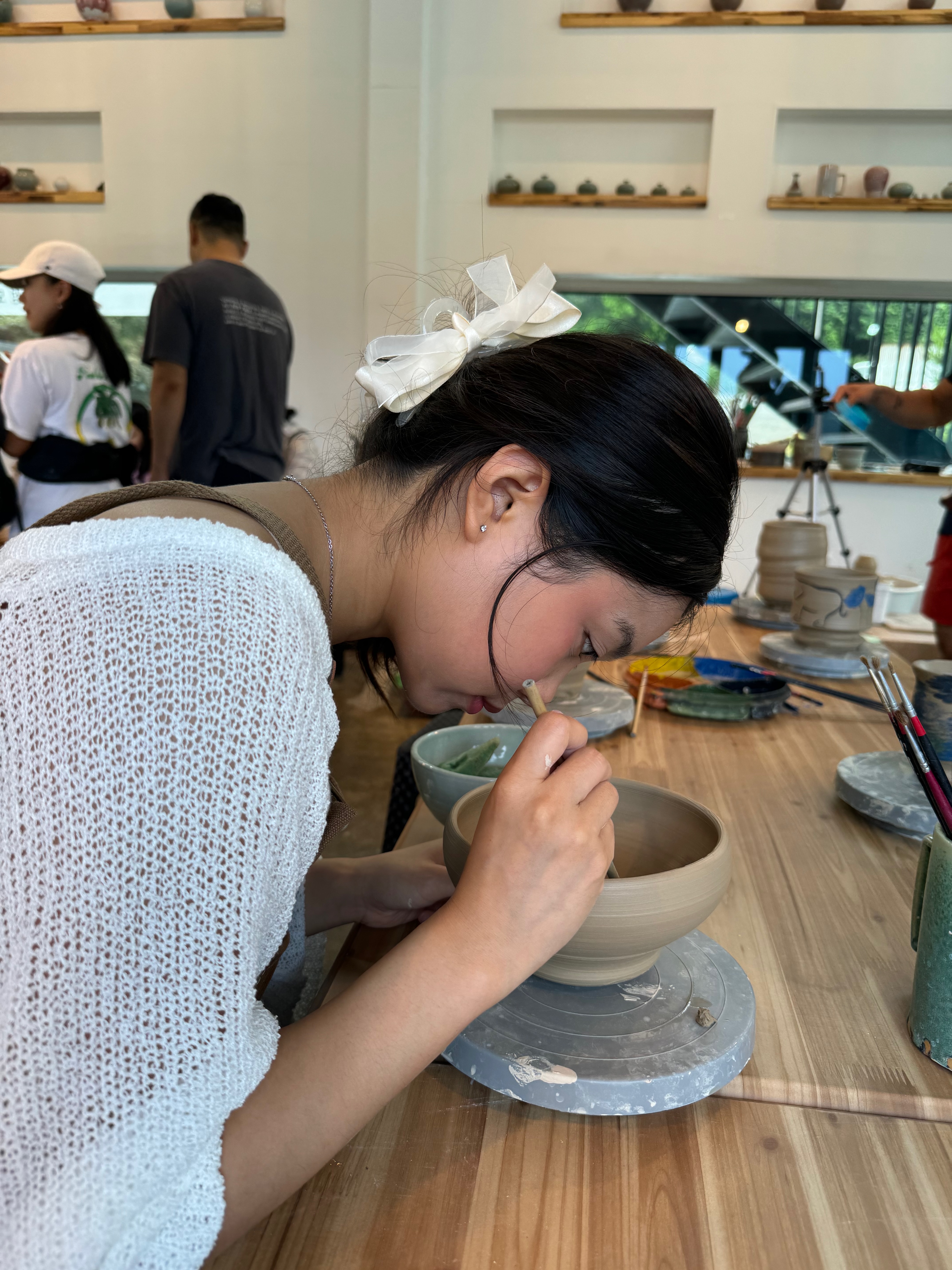 Painting a ceramic bowl